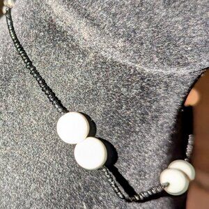 New black and white seed beads with large bead accents